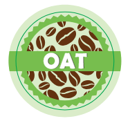 A roll of oat milk dietary label for coffee shops, predominantly green with coffee bean graphics and the text 'OAT' in large letters.