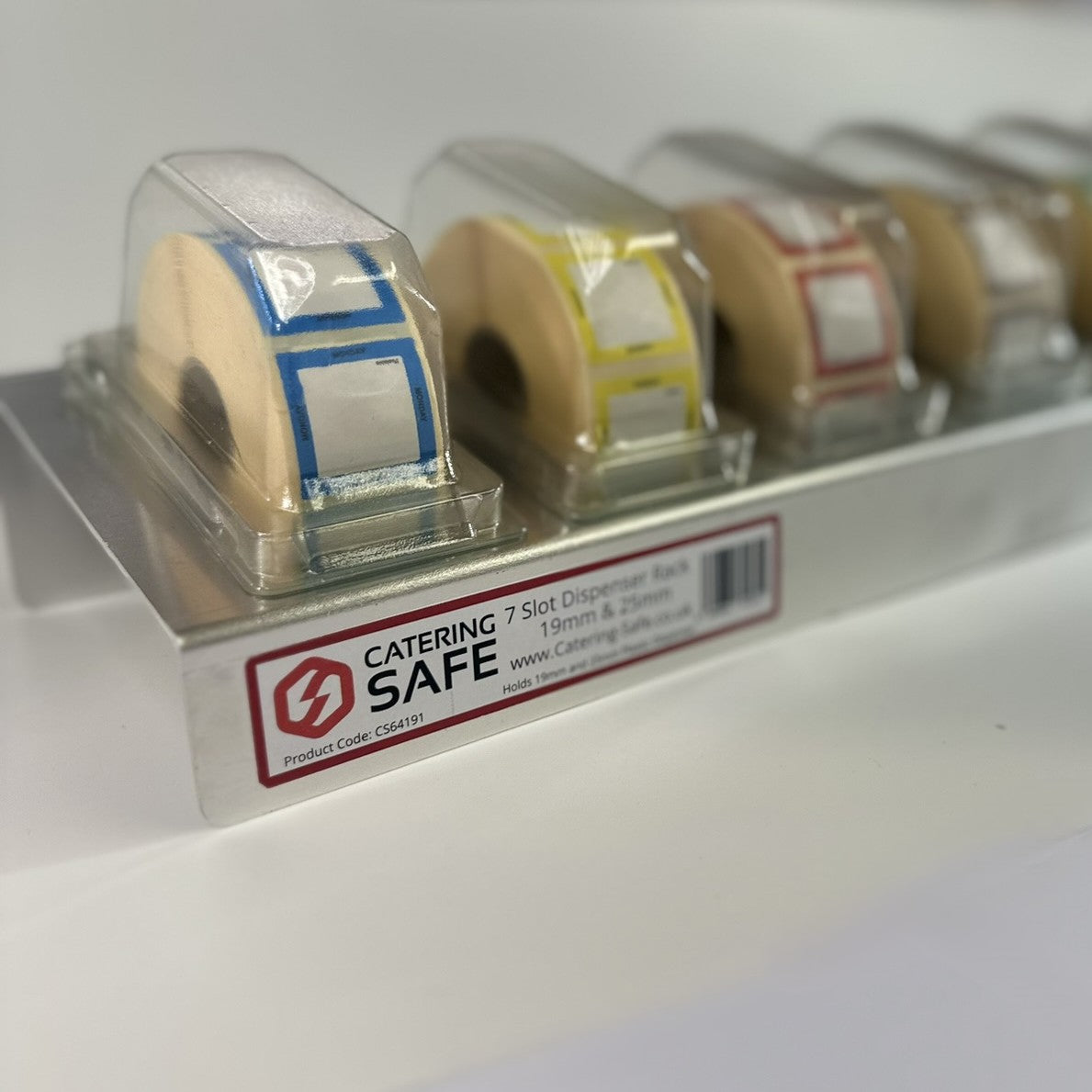 7 Slot Metal Dispensing Rack Complete with Label Carriers efficiently organizes kitchen labels for easy access at Catering Safe.